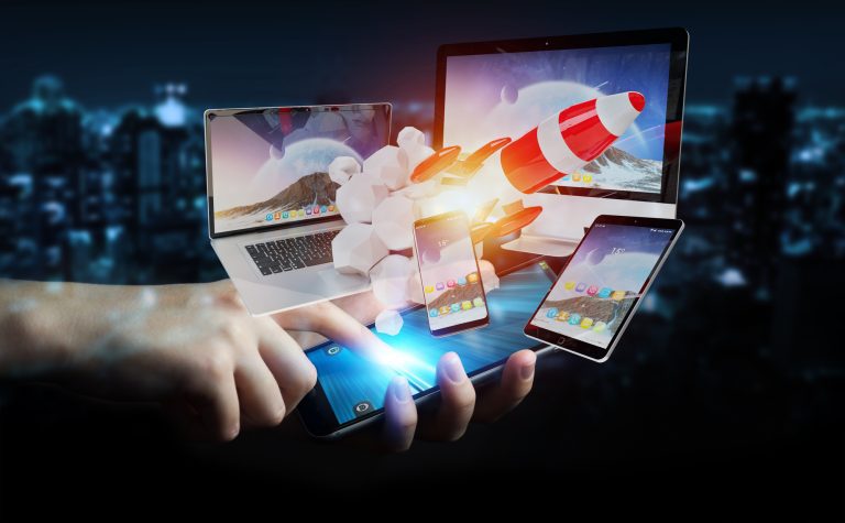 Businessman connecting tech devices and startup rocket 3D render